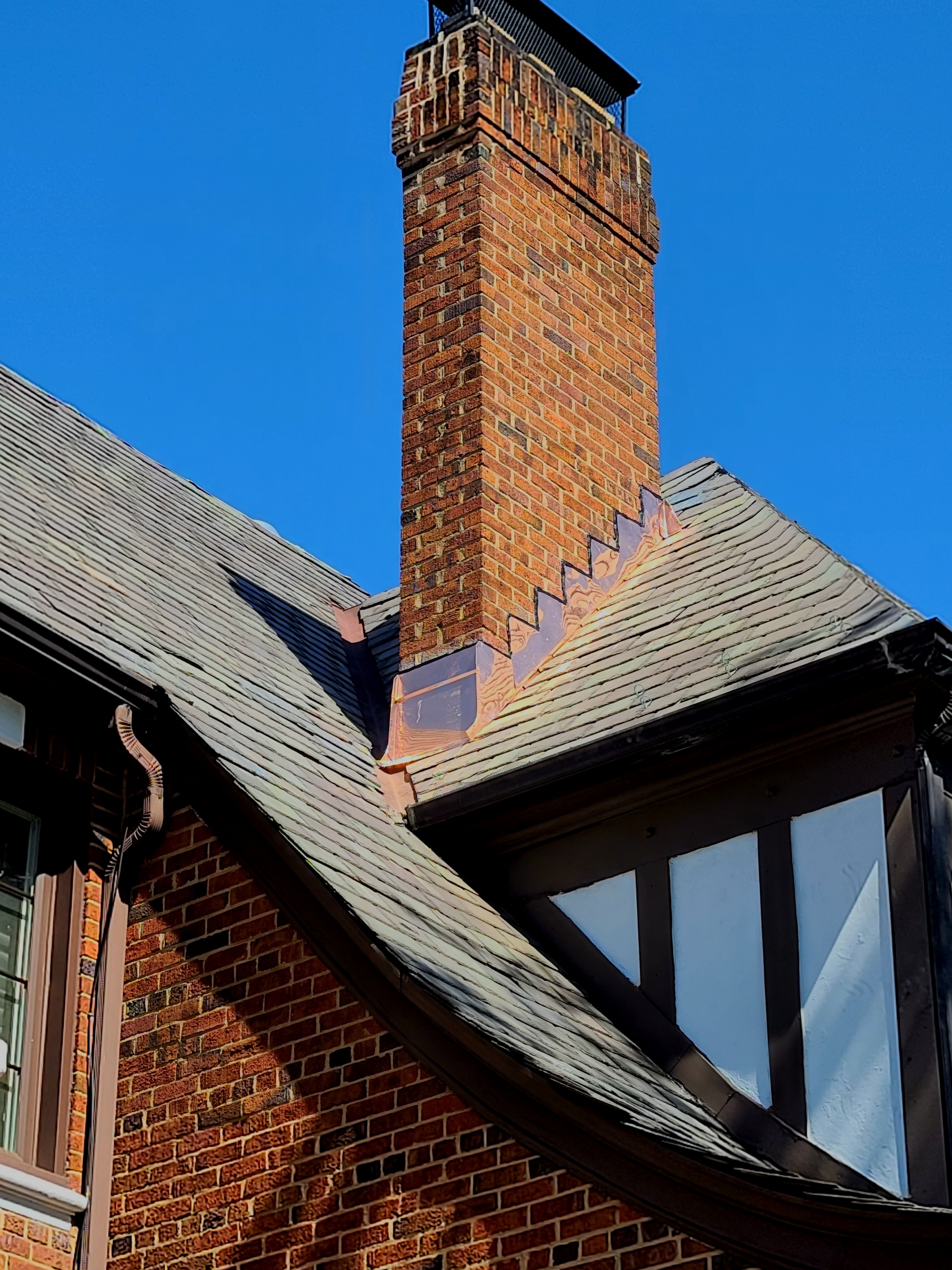 Roof and chimney detail used for exterior restoration service proof