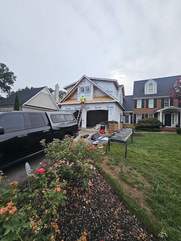Exterior siding and front renovation work in progress